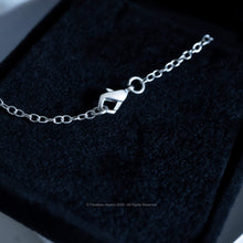 Frantumi - Collana con cuore spezzato in argento sterling