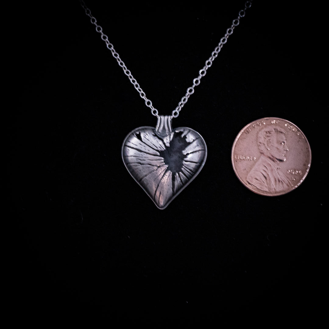 Frantumi - Collana con cuore spezzato in argento sterling